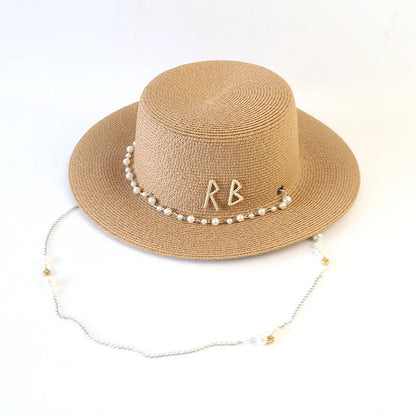 Hats with pearl chain accent